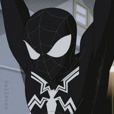 a black spider - man with his arms up in the air