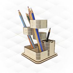 pencils and pens are in a wooden holder on a white background with geometric shapes