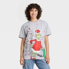 New Women's The Grinch Oversized Graphic Short Sleeve T-Shirt - Heathered Gray Medium Get Into The Christmas Spirit With This Adorable Grinch Shirt From Target. The Shirt Features A Cute Design Of Max And The Grinch, Perfect For The Holiday Season. Made With Lightweight Cotton Material, This Relaxed Fit T-Shirt Has Short Sleeves And A Round Neckline. The Shirt Is Available In Size 1x, Perfect For Plus Size Women. Whether You're Wearing It To A Festive Event Or Just Spreading Holiday Cheer, This Grinch Graphic, Grinch T Shirt, Motorcycle Women, The Grinch, Hem Style, Laid Back Style, Graphic Tee Shirts, Pink Tops, Christmas Outfit