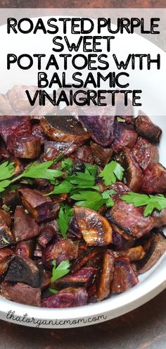 roasted purple sweet potatoes with balsamic vinaigrete in a white bowl