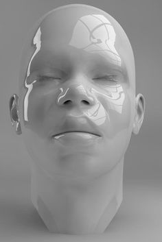 a white mannequin's head is shown with its eyes closed to the side