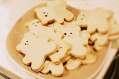 a plate full of cut up cookies on top of a counter