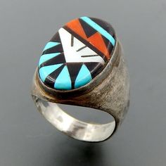 META  SILVER METAL STAMP/HALLMARK  SIGNED LGL ZUNI SIZE  11.5 WIDTH (inches/mm)  1.14 / 29.06 WEIGHT ( gram )  20.9 Multicolor Oval Inlay Rings, Oval Multicolor Rings With Inlay, Vintage Multi-stone Oval Cabochon Rings, Oval Multicolor Rings For Collectible, Vintage Multicolor Oval Jewelry, Oval Multicolor Rings For Collectors, Southwestern Oval Multi-stone Rings, Southwestern Style Oval Multi-stone Rings, Unique Oval Signet Ring Collectible