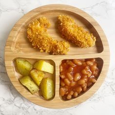 a wooden plate topped with different types of food