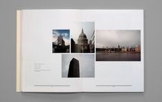 an open book with pictures of buildings and other things on the pages, including a clock tower