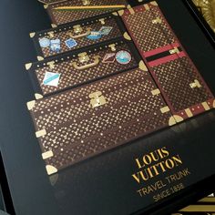 louis vuitton's travel trunk is displayed in front of a gold and black background