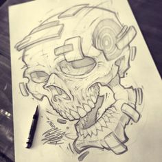 a drawing of a skull with a helmet on it's head is shown next to a pen