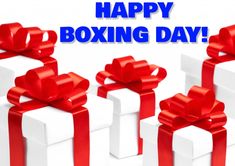 three white boxes with red bows and the words happy boxing day