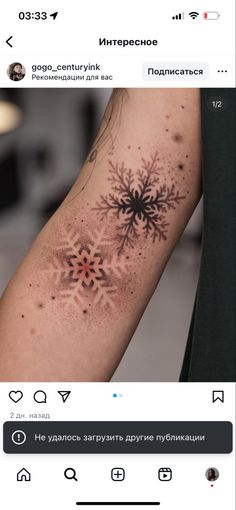 a person with a snowflake tattoo on their arm