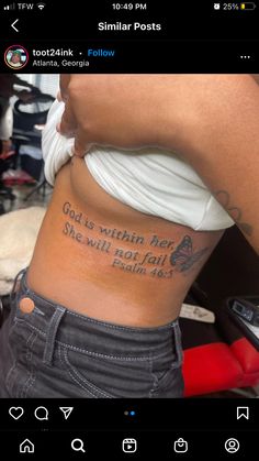 the back of a woman's stomach with an inscription on it that says god is nothing