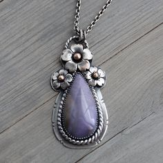 Burro Creek Lavender Jasper with hand fabricated cherry blossoms by Artist Élan Lee of Hapa Girls. Silversmithing Jewelry, Girls Handmade, Gold Jewelry Fashion, Handmade Artisan, Chain Pendants, Artisan Jewelry, Precious Metals