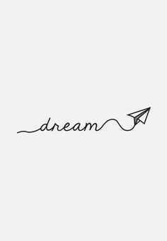 a black and white photo with the word dream written in cursive writing on it