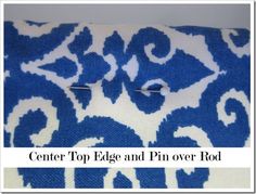 the center top edge and pinover rod on a blue and white patterned pillow cover