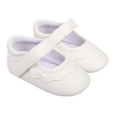 The Amina Crib is the perfect shoe for your little baby! The adorable ruffles and easy hook & loop closure make these adorable crib shoes extra special. They are perfect for that upcoming christening, baby shower or special holiday! Experience the luxury of a shoe that feels like a hug for those tiny toes. It's like a gentle embrace for every step your little explorer takes. Get ready to witness new milestones with the Amina Crib! These shoes are baby-friendly and parent approved! Features and B White Mary Janes With Soft Sole For Spring, White Booties For First Birthday Spring, White Booties For First Birthday In Spring, White Soft Sole Booties For First Birthday, White Booties For Baptism, White Closed Toe Booties For Baptism, Cream Booties With Soft Sole For Spring, Cute White Booties For Baptism, A Hug