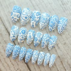 Your order will contain a full set of press on nails (unless you're providing your nail sizes for custom sizing) handpainted in a white color with various pastel blue Paisley designs.  Each set is made individually to order, therefore your order may not be exactly the same as pictured. SIZING- All nails are sold in a full set of 20 nails, with two of each size (0-9). I gladly accept customized sizing (10 nails) for 15% OFF with code "CUSTOM". Please include nail measurements(in millimeter, or mm, NO size number please) in NOTE TO SELLER section with custom size orders. This is because sizes of nail tips from different manufacturers might be slightly different, and I'd like to make sure my nails are a perfect fit for you. NAILS SHAPES & MEASUREMENT GUIDELINE- Please see the last 2 product p Paisley Print Nails, Paisley Pattern Nails, Nails For 15, Paisley Nails, Bandana Nails, Nails Shapes, Mandala Nails, Pastel Violet, Faux Nails