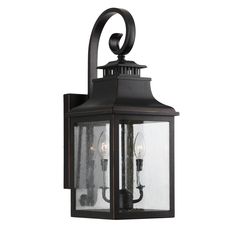 an outdoor wall light with two lights on the front and back of it, against a white background