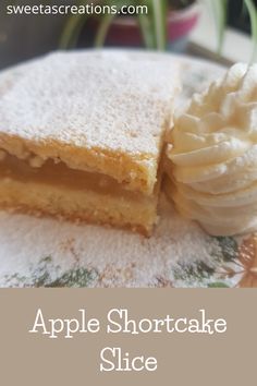 an apple shortcake slice on a plate with whipped cream