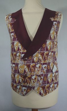 Double breasted waistcoat Guardians of the galaxy fabric with tow tone rad and black suiting notch collar. Has two front pockets and belt at the back. Measures 46 inches on the chest. Bespoke orders are welcome.  See something you might like in a different fabric or not the right size. Just send us a message. Thank you for shopping, looking, or even browsing through... Please add my shop to your favourites or even individual items that you love and may want to purchase...and call again...anytime Fitted Vest With Lapel Collar And Pockets, Fitted Vest With Pockets And Lapel Collar, Retro Fitted Sleeveless Outerwear, Fitted Vintage Vest For Costume Party, Vintage Fitted Vest For Costume Party, Vintage Sleeveless Vest For Costume Party, Fitted Red Retro Vest, Fitted Retro Red Vest, Retro Red Fitted Vest