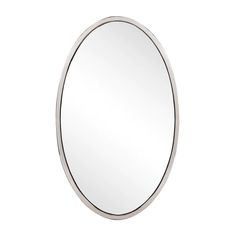 an oval mirror on a white background