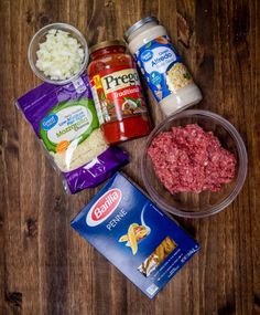 the ingredients needed to make this meatloaf are displayed on a wooden table top