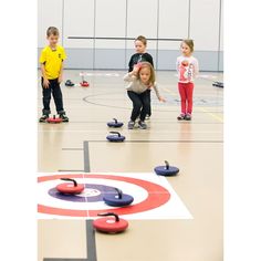 several children are playing with toys on the floor