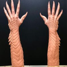 two fake hands that are on top of each other