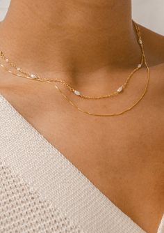 Elegant Double Strand Layered Necklace For Everyday, Minimalist Double Strand Pearl Chain Necklace, Dainty Double Band Jewelry With Delicate Chain, Elegant Gold Layered Necklace With Figaro Chain, Elegant Everyday Double Chain Jewelry, Elegant Everyday Double Chain Necklace, Delicate Double Chain Jewelry For Everyday, Fine Jewelry Clavicle Chain Necklace For Layering, Elegant Everyday Double Strand Chain Necklace