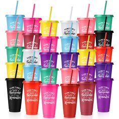 many different colored cups with straws in them