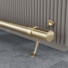 a close up of a metal door handle on a radiator in a room