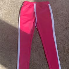 Men’s Pink Joggers With White Stripe On The Sides Drawing Strings Side And Back Pockets 95% Polyester 5% Spandex Stretch Pink Sweatpants, Pink Stretch Straight Sweatpants, Pink Jogging Bottoms With Pockets, Pink Straight Leg Sporty Sweatpants, Sporty Pink Straight Leg Sweatpants, Sporty Pink Straight Leg Pants, Sporty Pink Straight Leg Bottoms, Pink Stretch Sweatpants For Jogging, Pink Joggers