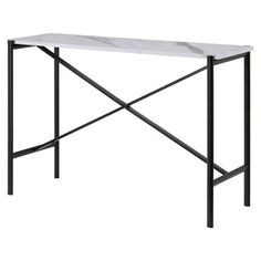 a white marble top table with black metal legs