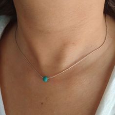 "Minimalist, wearable and delicate sterling silver necklace with turquoise beads. Length: available from 14\" (35cm) to 24\" (61cm). Width: turquoise bead 5 mm. Width 925 sterling silver chain: 0,66 mm. Strong 925 sterling silver lobster clasp. Handmade in Spain. Ideal for a gift and for combinate with other accessories. All our products are presented in a white organza bag. ♡ Made with love in Valencia ♡ ----------------------------- Discover the NICTE necklaces collection here: https://www.ets Turquoise Sterling Silver Necklace With Delicate Chain, Dainty Sterling Silver Turquoise Necklace, Dainty Turquoise Sterling Silver Necklace, Minimalist Turquoise Necklace, Minimal Choker, December Gift, Gold Armband, Moonstone Jewelry, 925 Sterling Silver Chain