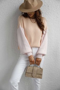 Our Estatia Knit Sweater comes in a beautiful colour blocking in the shades of blush and baby pink. So cosy you wouldn't want to take it off, this jumper features a crew neck, long drop sleeves and contrasting hues for a stylish drama. Pair it with our luxe ankle boots or trendy leather boots be the talk of the town! Size Guide: Ambre is 5’2” tall, and has a 33.2” bust, 24.5”waist, & 36.7” hips. She is wearing a S / US 4 / AU 8. This sweater is true to size. Feature: Long relaxed sleeves. Crew n Pink Long Sleeve Chunky Knit Top, Cream Color Block Long Sleeve Sweater, Pink Chunky Knit Long Sleeve Top, Pink Winter Sweater For Layering, Pastel Knit Sweater For Fall, Pink Knit Sweater For Layering, Pink Fall Sweater With Ribbed Cuffs, Fall Pink Sweater With Ribbed Cuffs, Trendy Pink Sweater For Layering