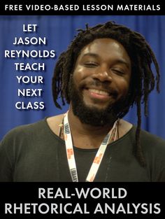 a man with dreadlocks smiles while standing in front of a blue curtain and text reading