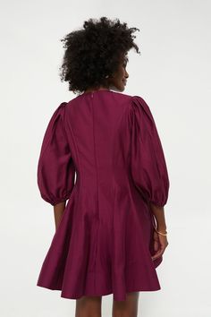 A wine-colored date night lookExude elegance in the Berry Loraine Mini Dress. With three-quarter length balloon sleeves, princess seams with boning, and a flared hem, this flirty silhouette is perfect for special occasions. Pair with high boots and a shoulder bag for a more casual approach, or dress up with heels and a clutch!Our Favorite Details: Horse hair in hem for structure Back zip closure Side pockets Lined Material: 86% Tencel, 14% Polyester (shell), 100% Polyester (contrast), 80% Polyes Party A-line Mini Dress With Gathered Sleeves, Evening Mini Dress With Balloon Sleeves And Fitted Bodice, Fitted Dress With Ruffle Hem And 3/4 Sleeves, Fall Cocktail Puff Sleeve Dress With Lantern Sleeves, Fall Evening Puff Sleeve Dress With Bishop Sleeves, Fall Fitted Puff Sleeve Dress With Ruffle Hem, Party Dress With Voluminous Skirt For Fall, Formal Mini Dress With Balloon Sleeves For Fall, Fall Evening Puff Sleeve Dress With Balloon Sleeves