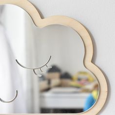 a mirror that is hanging on the wall