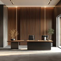 a modern office with wooden walls and black chairs in front of a large desk that has two planters on it