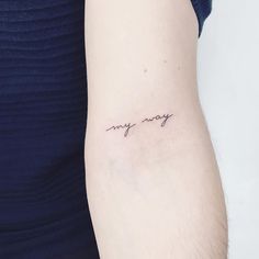 a woman's arm with a tattoo that says, my story