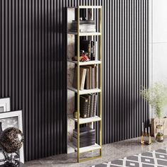 a tall book shelf sitting in front of a wall with black and white striped walls