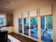 an open room with sliding glass doors leading outside