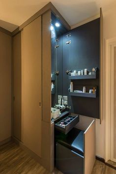 the inside of a beauty salon with its lights on and shelves full of cosmetics products