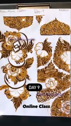 an image of gold and white paper with different designs on it, including the words online class