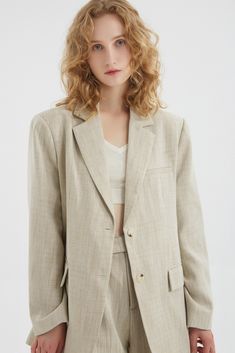 This oversized blazer made with linen pairs well with all outfits. Drawing inspiration from unisex apparel, you can match it with a slim spaghetti strap or t-shirt and baggy pants. Linen is cooling and highly breathable, perfect for sunny days and cool summer nights. Style #: WWSH910 Summer Business Casual Relaxed Fit Blazer, Linen Blazer For Everyday Spring Wear, Everyday Linen Blazer For Spring, Spring Linen Blazer For Everyday Wear, Long Sleeve Blazer For Everyday Summer Wear, Long Sleeve Summer Blazer For Everyday, Spring Office Blazer In Relaxed Fit, Summer Relaxed Fit Blazer With Lapel Collar, Spring Office Blazer With Relaxed Fit