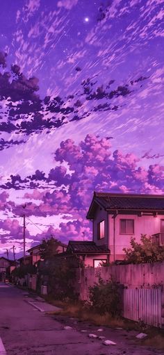 the sky is purple and there are clouds in the sky over houses at night time