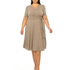 Product Description: Step into elegance with the Plus Size Stylish Solid Faux Wrap Dress featuring a Deep V-Neck. This chic and sophisticated dress is designed to flatter your curves while providing ultimate comfort. The faux wrap design creates a beautiful silhouette, and the deep V-neck adds a touch of allure. Crafted from high-quality, stretchable fabric, this dress is perfect for any occasion, from casual outings to formal events. Available in a range of solid colors, it's a versatile additi Moa Collection, Beautiful Silhouette, Womens Denim Dress, Long Beach Dress, Sophisticated Dress, Long Dress Casual, Plus Size Activewear, Tiered Maxi Dress, Short Mini Dress