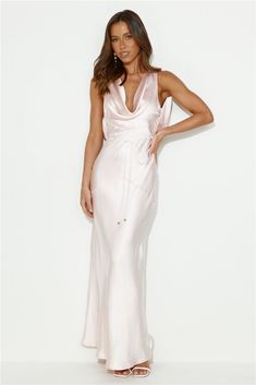 Length from shoulder to hem of size S: 144cm. Chest: 39cm, Waist: 32cm, size S. Maxi dress. Semi-lined. Model is a standard XS and is wearing size XS. True to size. Non-stretch. Crisscross tie-up. Cowl neck, back. Satin. Tie up back. Cold hand wash only. Zipper. Polyester. Bring your extravagant style to the party in the Designer 'Fit Cowl Neck Satin Maxi Dress. Featuring a crisscross tie up and a cowl neck and back. Style with heels and curls to be best dressed. First Day Outfit, White Prom Dress, Bridal Shower Dress, Shower Dresses, Jumpsuits And Romper, Feather Dress, Satin Maxi, Satin Maxi Dress, Shop Maxi Dresses