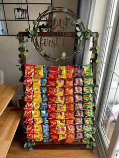 an assortment of chips on display in front of a window