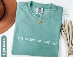 This Comfort Colors® Christian shirt, Jesus apparel, makes a thoughtful Christianity gift for women. With its blend of faith-inspired design and religious sentiment, it's the perfect religious tee for a religious gift as a church t-shirt. Welcome to Gift Vibe Shop - Your Fashion Wonderland! **SIZING** The shirts are unisex and run true to size, but size up for a more oversized fit. Please refer to the photo cards for a detailed size guide. ** SHIPPING**  All shirts are made to order and shipped Faith Tshirts, Christian Gifts For Women, Women Of Faith, Religious Gifts, Christian Shirts, Christian Gifts, Comfort Colors, Gifts For Women, Halloween Shopping