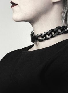 - Faux Leather, Silver Metal, Acrylic Chain- Sizes from 13.5″ = 34cm neck circumference and up- Super limited availability- Ready to ship---  Chaine Choker ---Minimalist link choker in matte black faux leather and gloss acrylic black chain. Wear on side, front or back. Armor Collection.★★★MATERIAL:Faux Leather, Silver Metal, Acrylic Chain★★★SIZE:Unisex. Sized by neck circumference starting from 13.5″ = 34cm and up. Adjustable.★★★SUGGESTED CARE:Hand wash with a sponge and mild detergent.......... Edgy Choker With Adjustable Chain, Punk Black Jewelry With Chain Strap, Black Punk Jewelry With Chain Strap, Edgy Streetwear Choker Necklace, Punk Style Chunky Chain Necklace For Party, Black Curb Chain Jewelry For Streetwear, Gothic Chain Choker For Concerts, Black Punk Jewelry With Chunky Chain, Black Punk Jewelry With Chain