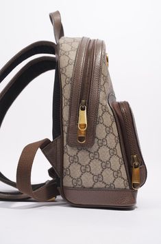 Brand: Gucci Style: Ophidia GG Backpack Size: Small Width: 22cm Height: 29cm Depth: 11cm Handle Drop: 11cm Strap Drop: 25cm - 40cm Exterior Colour: Supreme Interior Colour: Beige Hardware Colour: Gold Serial Code: 547965 493075 Manufactured In: Italy Comes With: Luxe Collective Dustbag Gucci Leather Backpack With Adjustable Strap For Everyday, Luxury Gucci Standard Backpack, Luxury Gucci Backpack For Daily Use, Gucci Purse Backpacks For Women, Luxury Gucci Women's Backpack, Gucci Style, Interior Colour, Gucci Fashion, Colour Beige